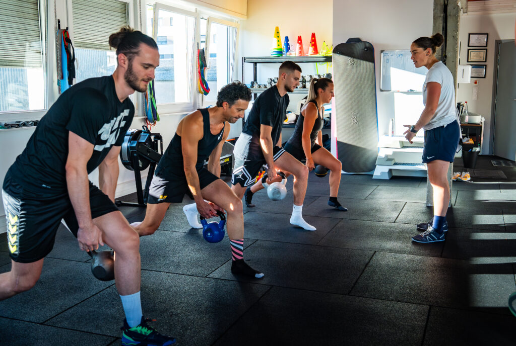 Travail en groupe autour de la stabilisation du bassin essentiel dans la course à pied et le Trail